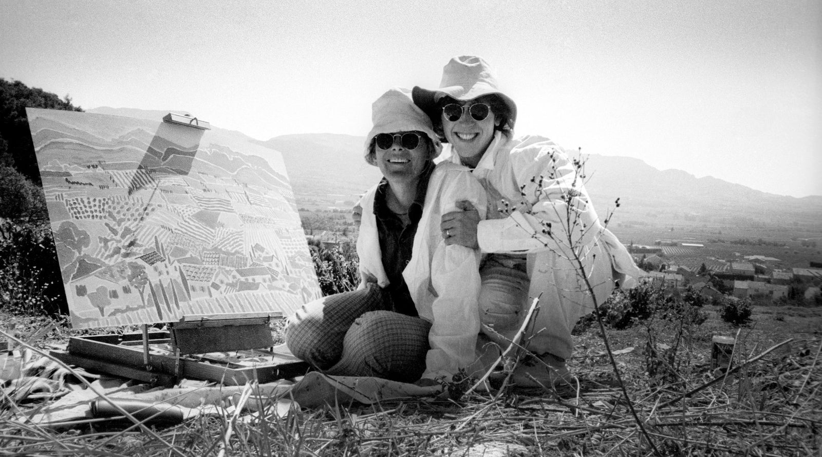 Artists Joanne Short and John Dyer painting in the vineyards of Provence in France