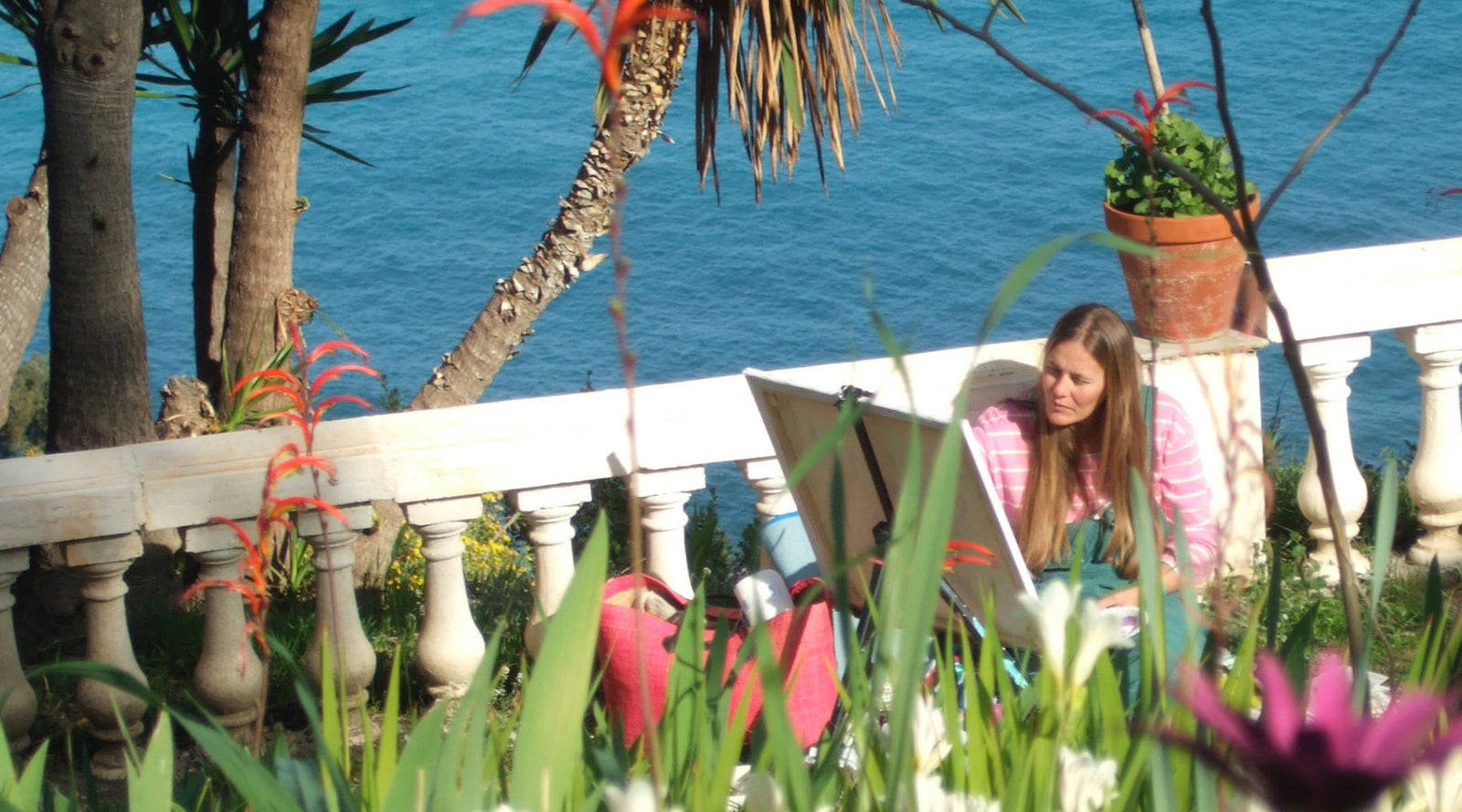 British artist Joanne Short painting flowers in the Giardini Hanbury in Italy