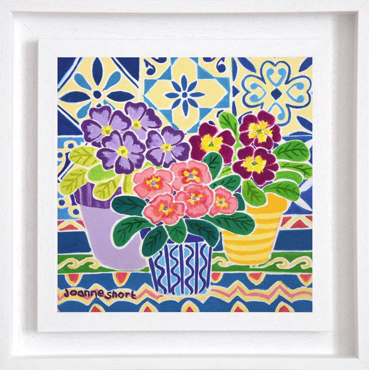 Framed artwork of colorful flowers in pots with a patterned border. 'Spring Flowers on a Patterned Tablecloth', 8 x 8 inches oil on canvas still life. Painting by Cornish Artist Joanne Short