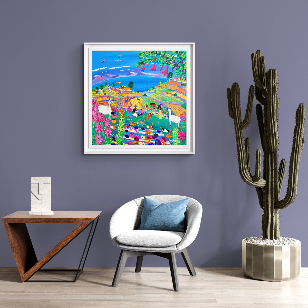 Modern living room with a colorful painting, wooden table, chair, and cactus plant. 'Colourful Potato Fiesta on Taquile Island, Peru'. 35.5 x 35.5 inches acrylic on canvas. Painting of Peru by John Dyer