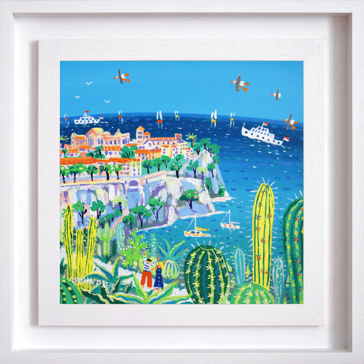 Framed artwork of a coastal scene with buildings, trees, and cacti. 'Exploring the Jardin Exotique, Monaco'. 12 x 12 inches acrylic on canvas. Painting of Monaco, France by John Dyer
