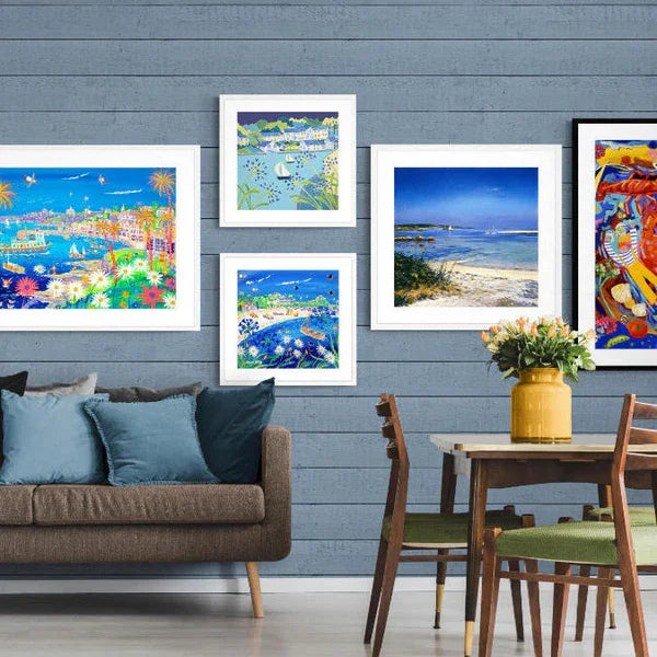 A collection of Cornish art prints by John Dyer, Joanne Short and Ted Dyer in a contemporary room
