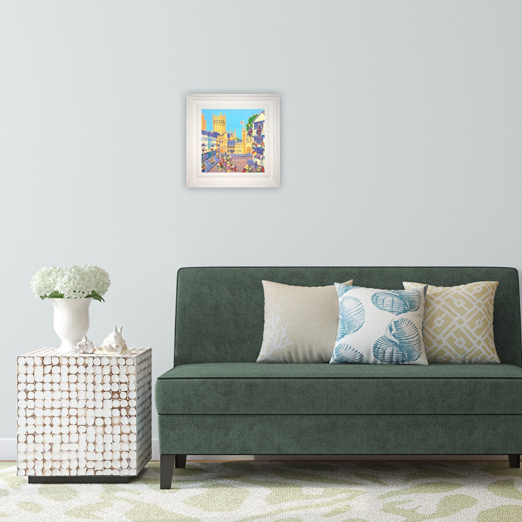 'Hanging Baskets, Bunting & Flags, Market Square, Wells'. 12x12 inches oil on canvas. Paintings of Somerset by Joanne Short. Somerset Art Gallery Joanne Short