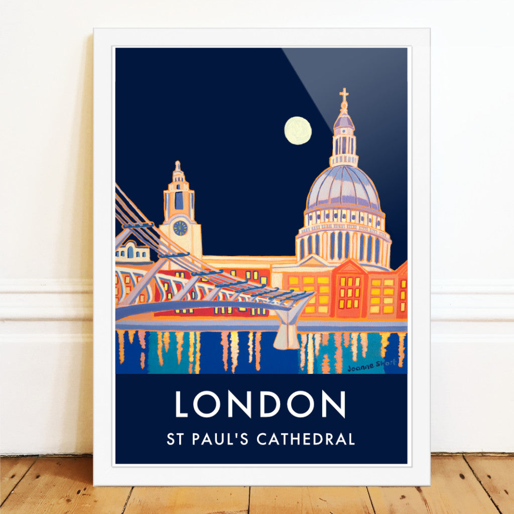 London wall art poster print of St Paul's Cathedral at night by British artist Joanne Short. We think this is possibly one of the best ever London vintage style travel art posters. Joanne Short's painting 'Full Moon over St Paul's Cathedral' is remarkable in so many ways and creates a fabulous travel poster of London. A full moon illuminates St Paul's Cathedral and the London skyline & everything is reflected in the River Thames. Vintage style typography completes the look of this piece.
