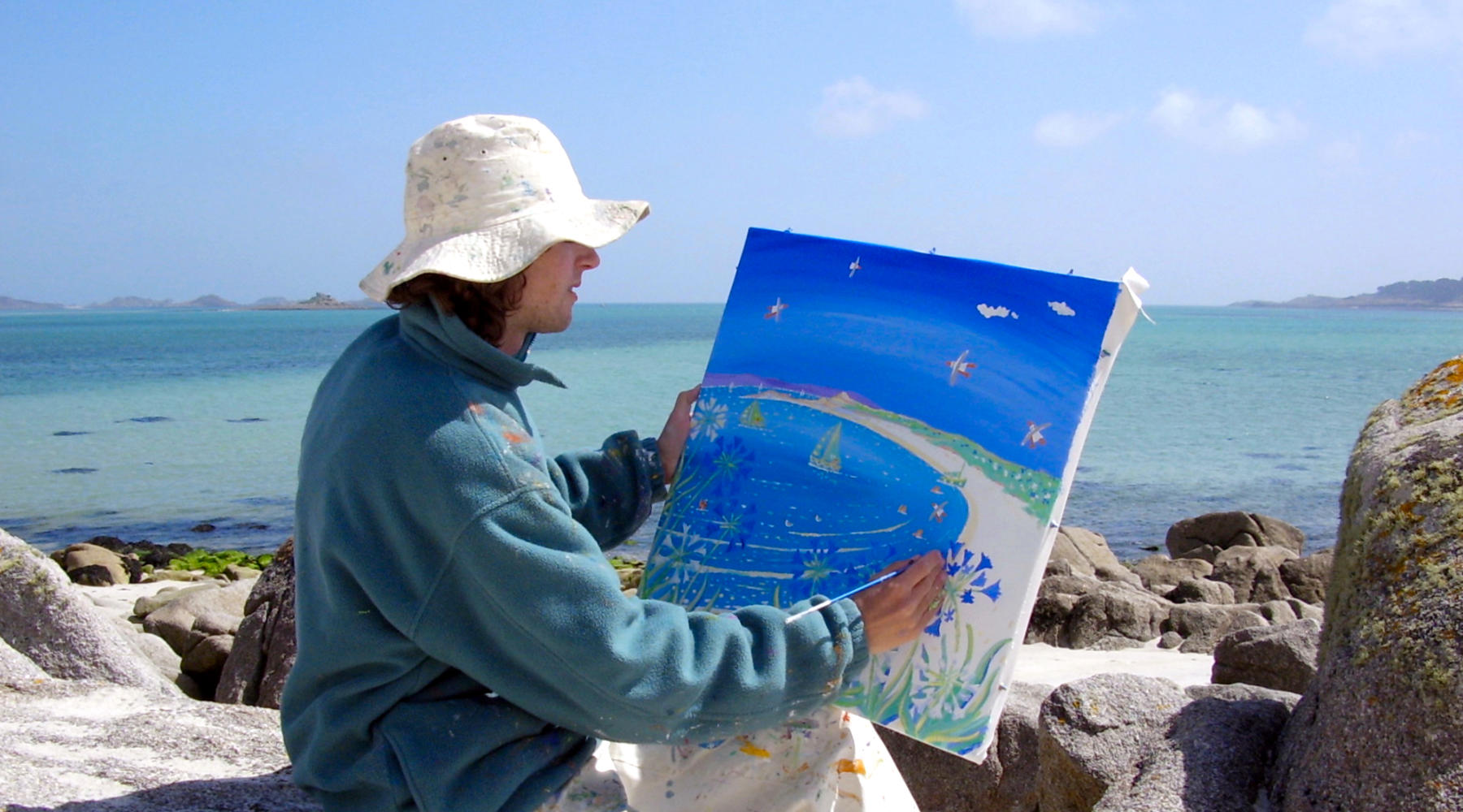 Cornwall's most famous contemporary artist John Dyer painting on the island of Tresco in Cornwall
