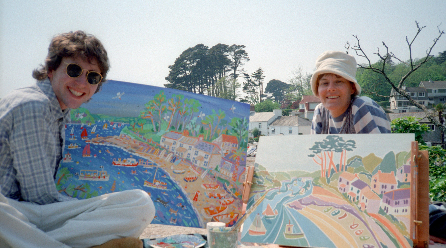 Cornwall artists John Dyer and Joanne Short pictured painting on the cliffs at Helford Passage on the South Coast of Cornwall