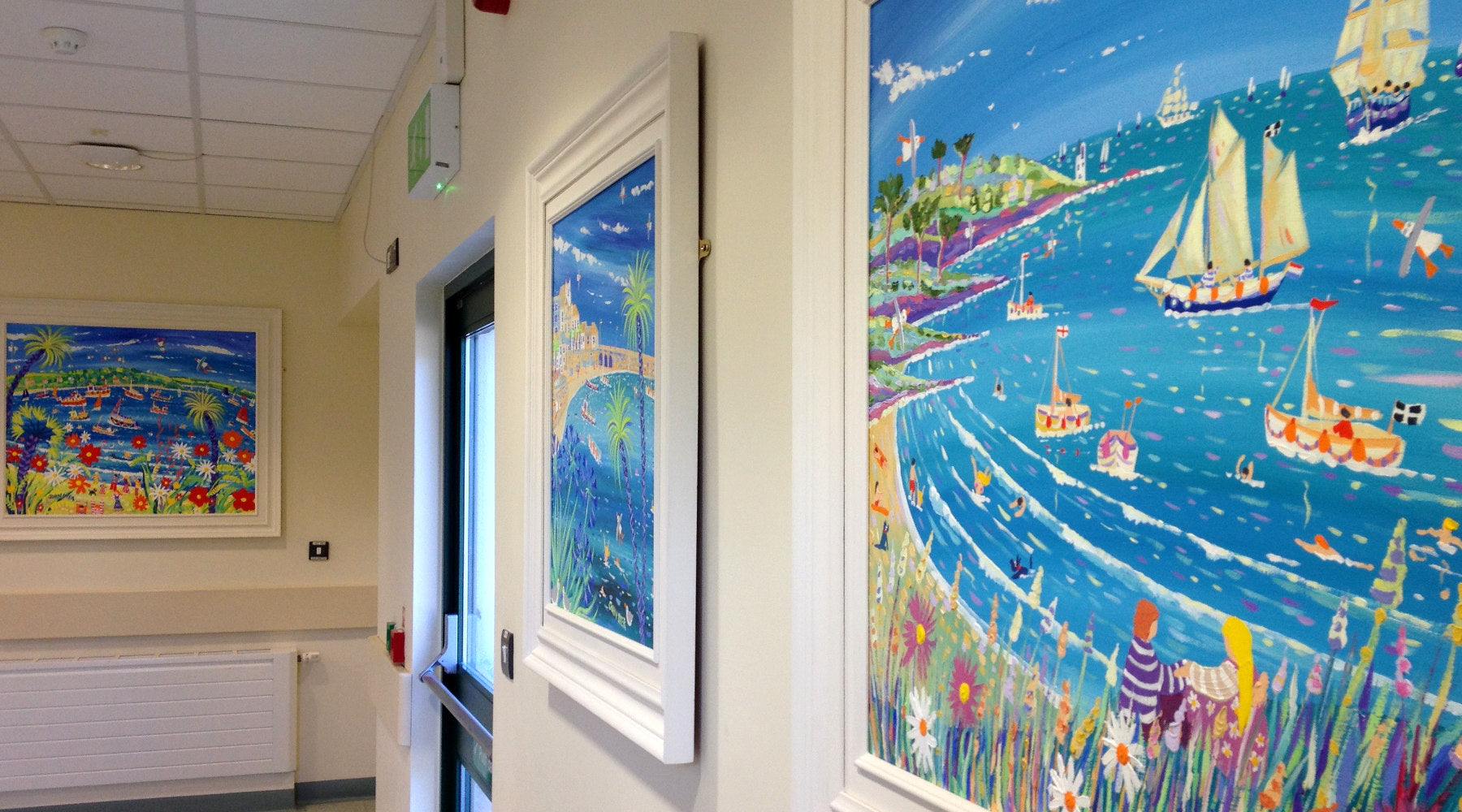 John Dyer paintings hanging in the oncology unit at the Royal Cornwall Hospital in Truro, Cornwall