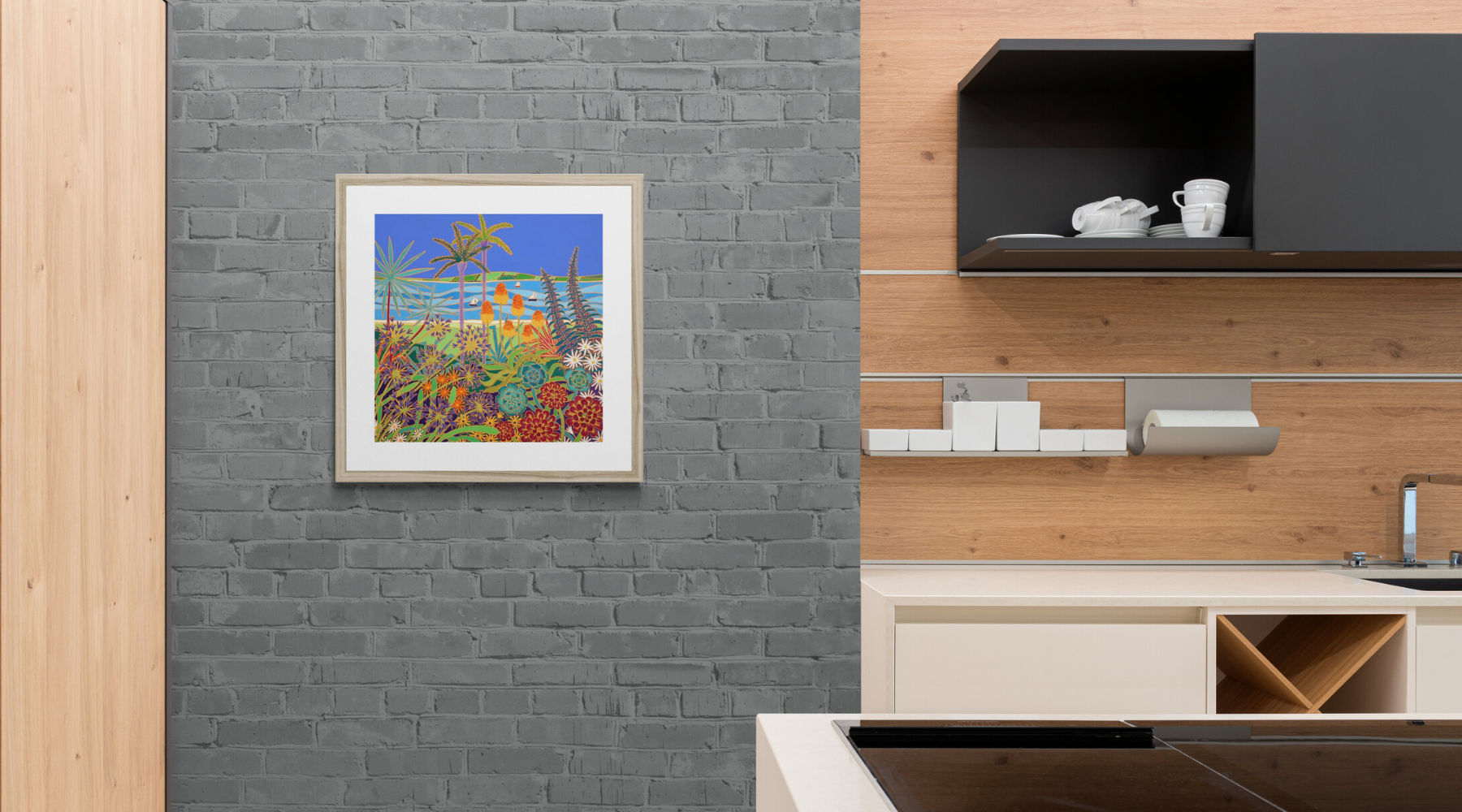 Art displayed in a kitchen setting. Print features art by Cornish artist Joanne Short of the Tresco Abbey Gardens