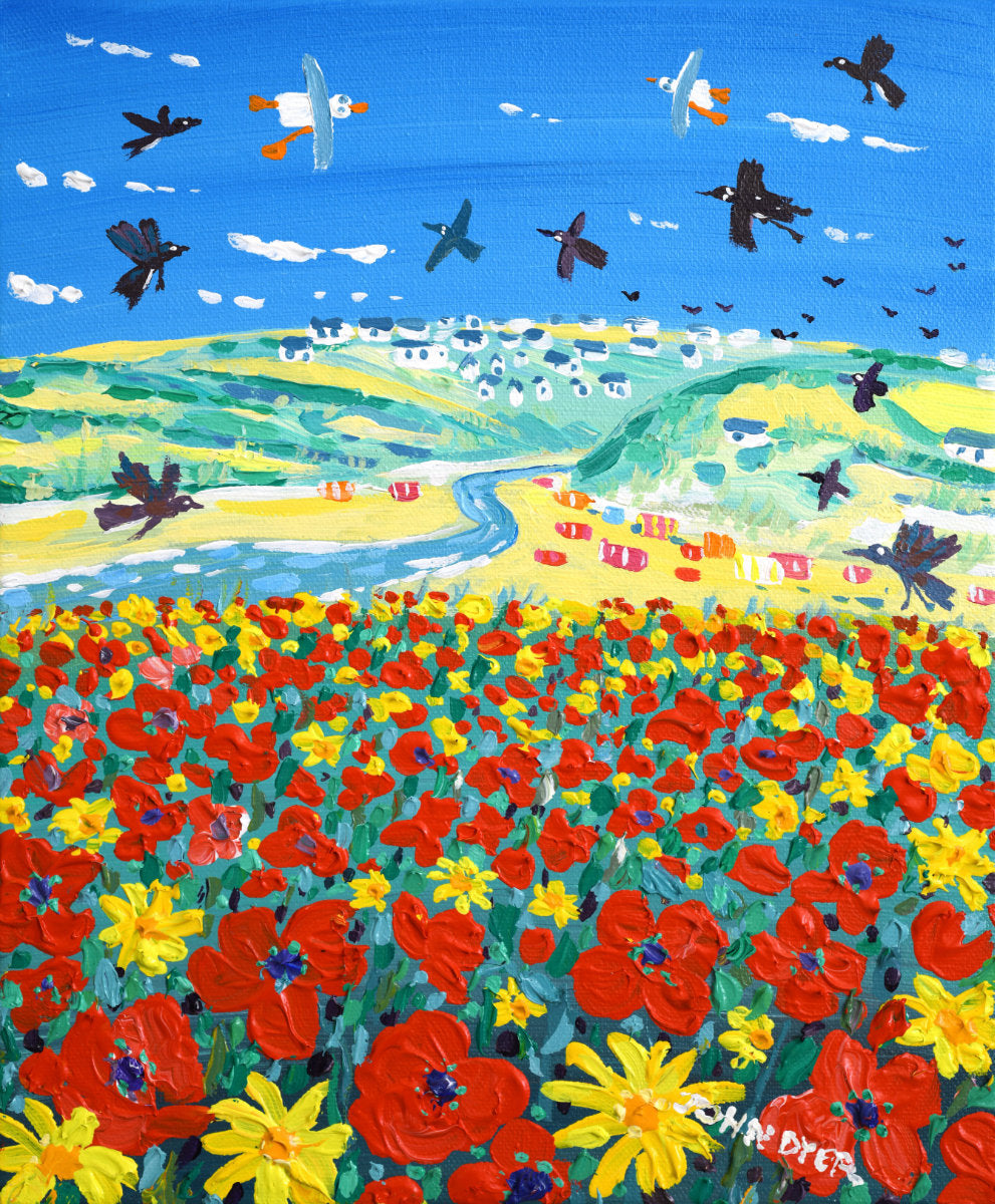 A colorful landscape painting featuring a field of red and yellow flowers in the foreground, green hills in the distance, a winding blue river, and several birds flying in a bright blue sky with white clouds. 'Skylarks and Poppies, Crantock Beach', 12 x10 inches acrylic on canvas by Cornish Artist John Dyer