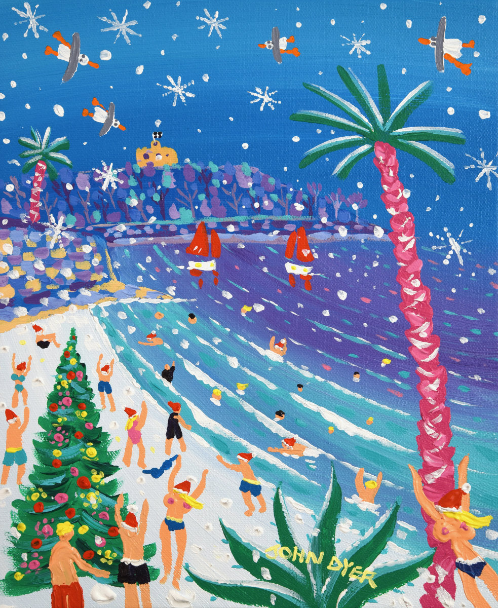 Colorful artwork of a tropical beach scene with Christmas elements, including palm trees and a Christmas tree, with people enjoying the beach. 'Gylly Beach Christmas Swimmers’, 12x10 inches acrylic on canvas. Painting of Cornwall by Cornish Artist John Dyer