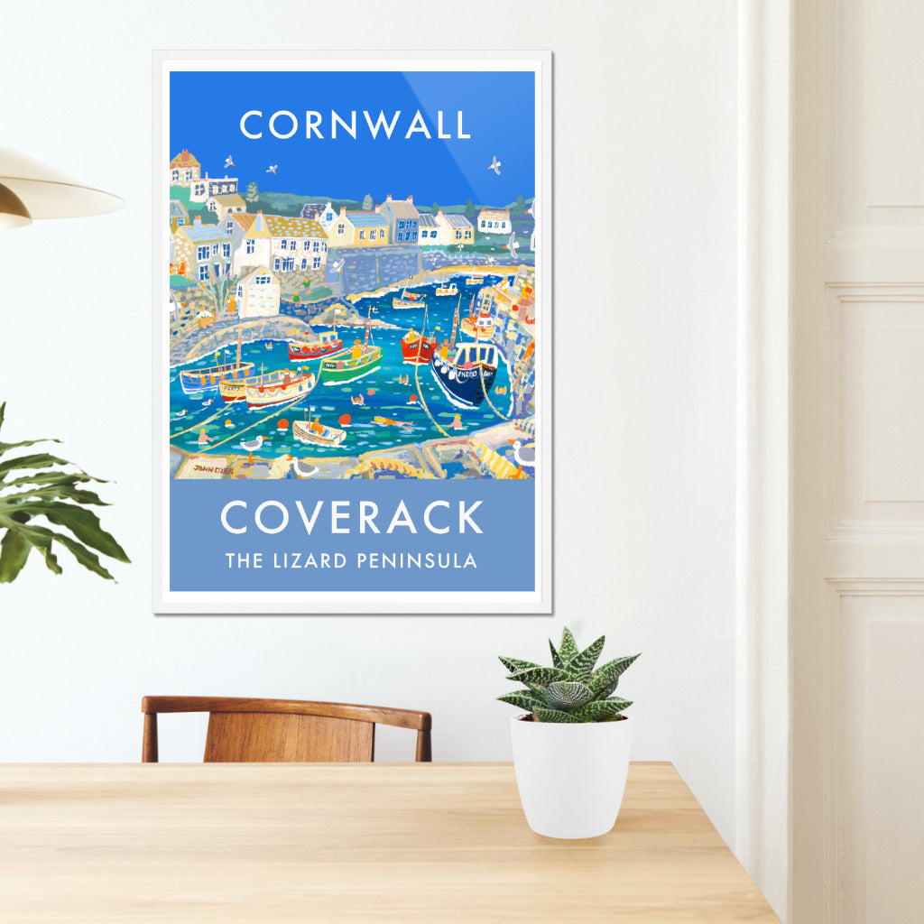 A spectacular wall art poster print of Coverack harbour in Cornwall by Cornish artist John Dyer. The painting featured on this vintage style travel poster is one of the artist&#39;s best known works. Colourful fishing boats pack the harbour and swimmers enjoy the clear salty water. The Cornish cottages and stone work create a real sense of place. Beautiful. Available either unframed or framed and ready to hang on your wall at home.