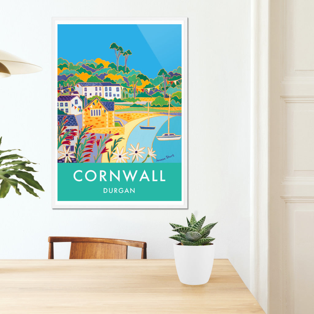 Cornwall framed wall art poster print of Durgan and the Helford River by Cornish artist Joanne Short. A stunning vintage style art travel poster of Durgan Village on the Helford river in Cornwall featuring Joanne Short&#39;s wonderful painting &#39;Summer Bunting, Durgan&#39;. A beautiful use of line and colour epitomise Joanne Short&#39;s art and this piece has great movement and space. Bunting adorns the village ready for the regatta day and the sea gently laps on the beach. Perfect.