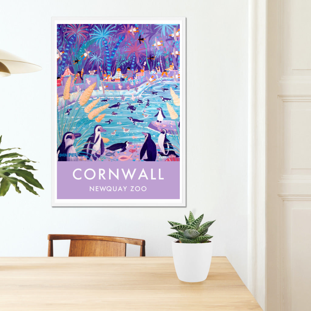 Wall art poster print of humboldt penguins at the zoo by artist John Dyer. Painted during John&#39;s official Darwin 200 residency at Newquay zoo for the UK&#39;s Darwin 200 celebrations. The crowds are enjoying the penguins and are feeding them with fish as the penguins swim around in their penguin pool. Beautiful purple and blue colours are used throughout the piece. Available unframed or framed and ready to hang in your home.