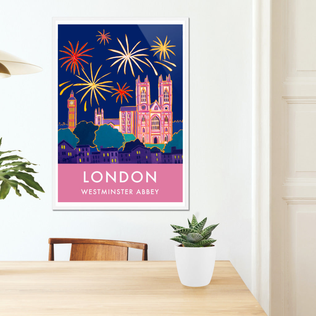 London wall art poster of Westminster Abbey with fireworks by British artist Joanne Short. Joanne Short&#39;s painting &#39;New Year Celebrations, Westminster Abbey, London&#39; features on this beautiful vintage style art poster of London. Fireworks explode in the night sky over the London skyline. Big Ben can be seen illuminated in the background and Westminster Abbey is illuminated in pink and purple colours. A really magical image that creates a striking travel art poster.