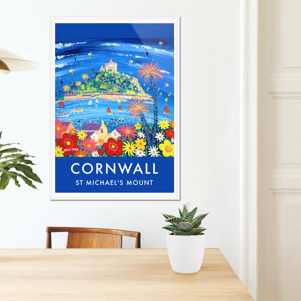 This is a spectacular wall art poster print of artist John Dyer&#39;s painting &#39;Summer Flowers, St Michael&#39;s Mount&#39;. The print radiates colour and all the fun of the seaside. The view is from above Marazion looking towards the amazing island of St Michael&#39;s Mount. Bold use of color and form, towering palm trees, seals, boats and swimmers all combine to create a perfect art poster of Cornwall. Available unframed or framed and ready to hang in your home.
