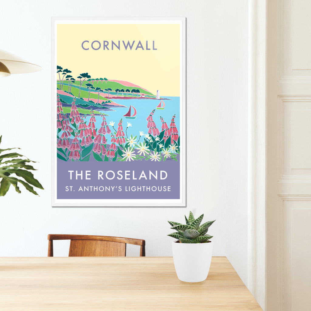 Cornwall framed wall art poster print of St. Anthony&#39;s Lighthouse on the Roseland Peninsula by Cornish artist Joanne Short. This vintage style art poster of St. Anthony&#39;s Lighthouse on the Roseland Peninsula in Cornwall by acclaimed Newlyn Society Artist Joanne Short is absolutely spectacular. Gorgeous colour combinations with foxgloves, daisies and a perfect blue sea create a wonderful vision of Cornwall. Stunning type and use of colour complete this very special travel archival art poster print.