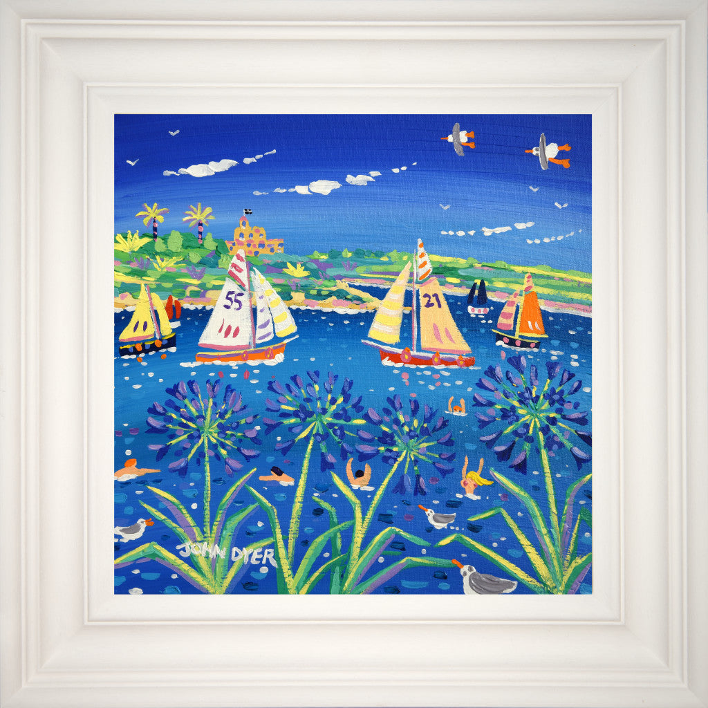 Gaff rigged sailing boats and blue agapanthus flowers have provided the inspiration for this painting by Cornish artist John Dyer. The artist has chosen a view through the flowers towards St Mawes Castle on the Roseland Peninsula. The artist has captured swimmers enjoying the summer sunshine and the whole painting is a celebration of life on the coast of Cornwall in Falmouth.