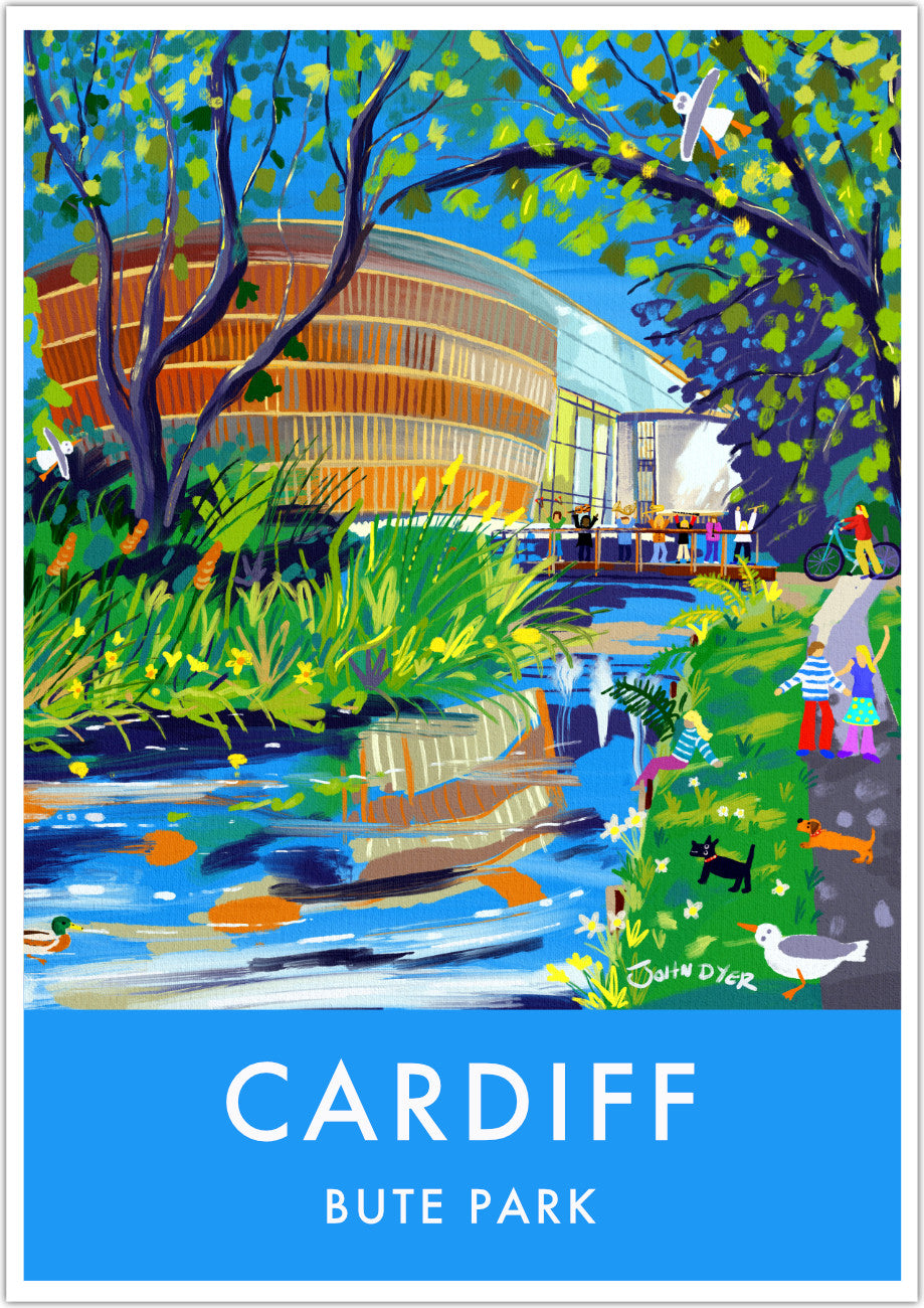 This stunning wall art travel poster print by John Dyer features the Royal Welsh College of Music and Drama in Bute Park, Cardiff in Wales. A family stroll through the park under the trees alongside the river. A duck, seagulls, scotty dog and sausage dog look on and on the bridge to the RWCMD musicians wave their musical instruments in the air celebrating their musical lives. Available unframed or framed and ready to hang in your home, student digs, business or office.