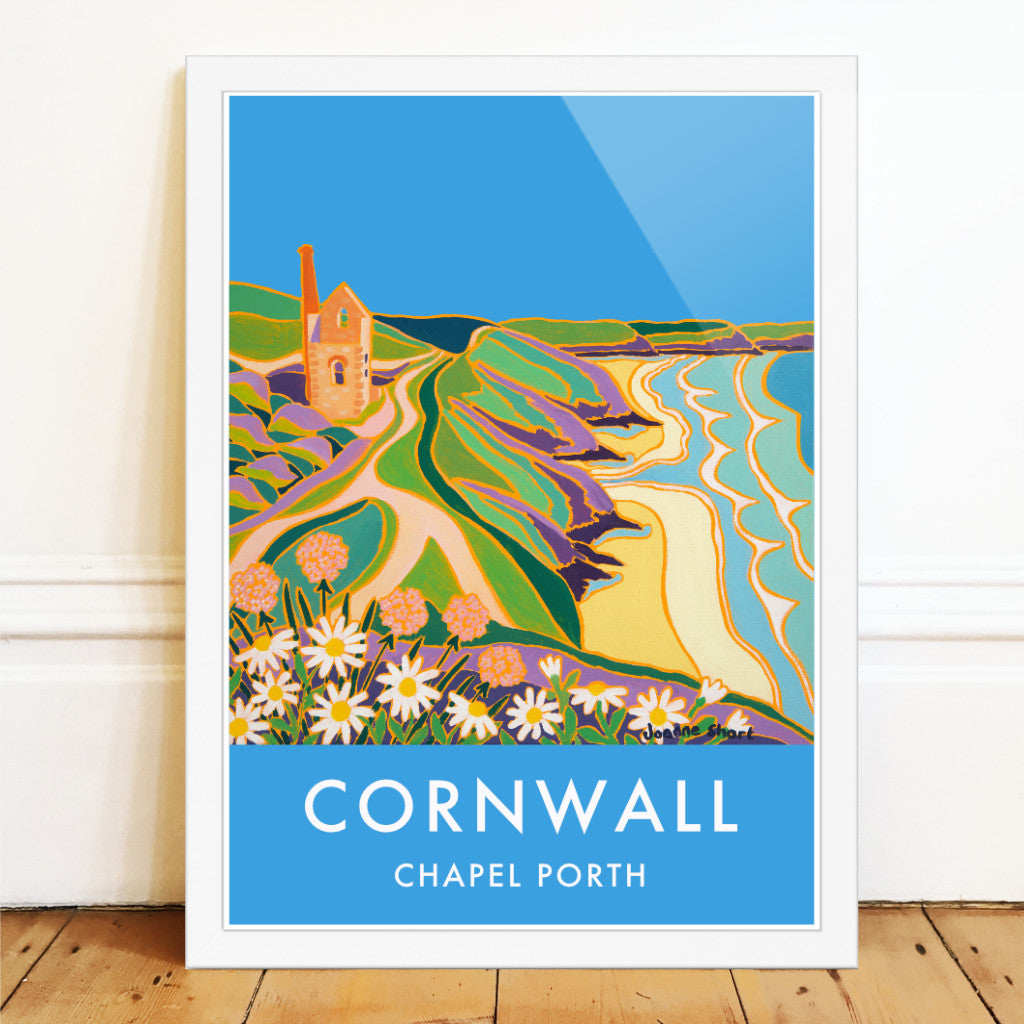 Cornwall wall art poster print of Chapel Porth Tin Mine at St Agnes by Cornish artist Joanne Short. The Cornish tin mine of Wheal Coates, at Chapel Porth St Agnes, is the subject of the painting by Joanne Short that is featured on this stunning art poster print. The beautiful blue Cornish sky sets off the warm colours of the brick work in the old engine house beautifully. Wild flowers feature in the print and the waves roll into the shore along the coast and coastal path
