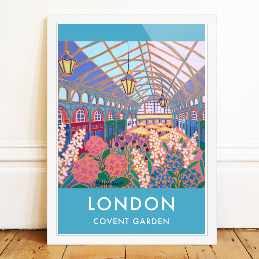 London wall art poster print of the flower market at Covent Garden by British artist Joanne Short. This vintage style art poster of the Flower Market, Covent Garden by artist Joanne Short is absolutely delightful and a perfect way to celebrate London in style. The artist has captured the architecture perfectly and her flat use of colour really helps to create the space and form in this piece. Flowers fill the foreground in this really lovely example of Joanne Short&#39;s work.