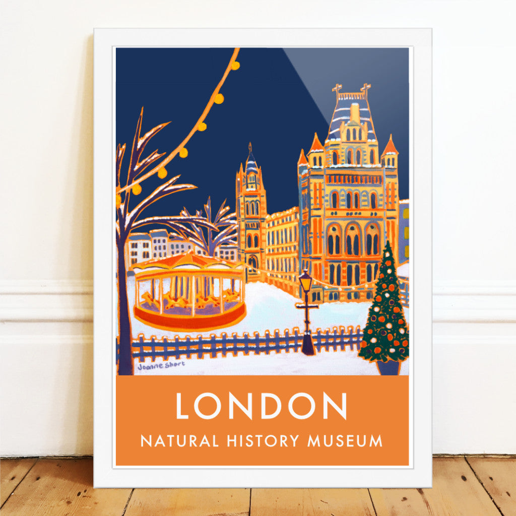 London wall art archival poster print of snow at the Natural History Museum and a winter carousel by British artist Joanne Short. Joanne Short&#39;s wonderful painting &#39;Christmas Carousel, Natural History Museum&#39; features on this superb vintage style art poster print of London. The Natural History Museum dominates the image and is set against a deep blue sky. The snow on the ground creates a wonderful setting for the colourful carousel and the twinkling lights on the Christmas tree.