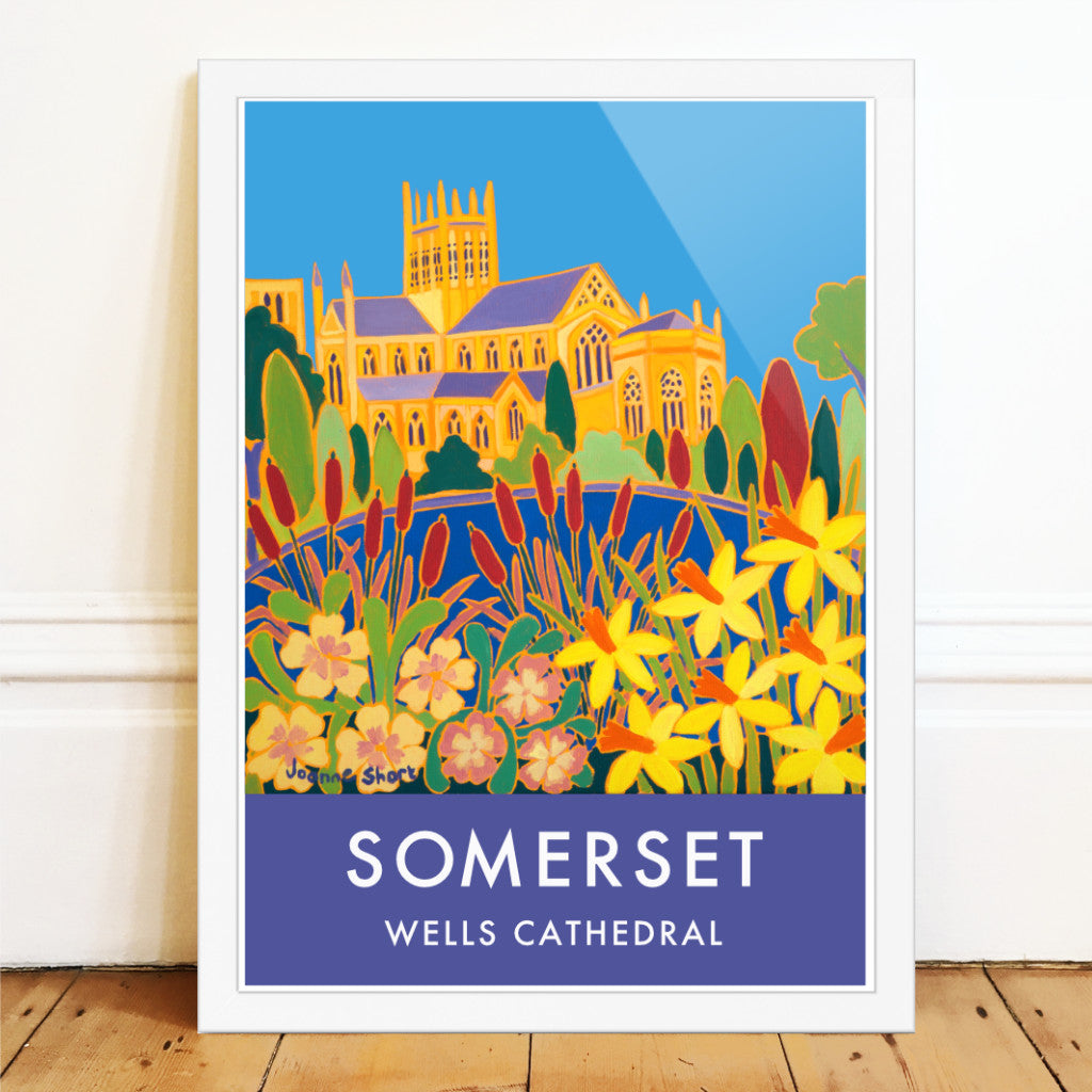 Wall art poster print of Wells Cathedral in Wells Somerset, with spring flowers and daffodils by British artist Joanne Short. Wells in Somerset is one of England&#39;s most beautiful cities. Artist Joanne Short lives and works in Wells as well as from her studio in Cornwall. Her painting from the Bishop&#39;s Palace garden looking back to the stunning Wells Cathedral
