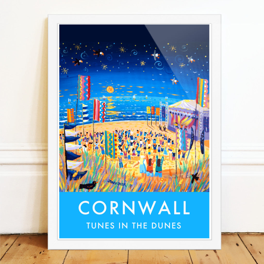 A stunning wall art poster print of the Tunes in the Dunes Music Festival on Perranporth Beach in Cornwall by Cornish artist John Dyer. A night sky full of stars with a glowing North Cornwall sunset lights up the festival flags and crowd. Wild grasses, sand dunes, puffins &amp; seagulls create the essence of Cornwall. A group of teenagers dance in the dunes and colourful lights radiate from the stage.